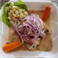 Ceviche de Pescado · Fish fillet cut into pieces and marinated in key lime juice, onions. Accompanied by side dis...
