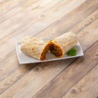 Rice and Beans Burrito · Freshly Daily Made Re Fried Beans, Our Famous Mexican Rice  and Wrapped up in a Hand Made Fl...