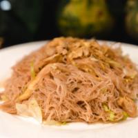 Singapore Style Noodle Stir Fry · Shredded cabbage, green onion, bean sprouts, yu choy (Chinese greens), bean sprouts and topp...