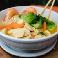 Tom Yum Soup · Chicken, shrimp, bok choy (Chinese cabbage), fishball, carrot slices, tom yum flavoring topp...