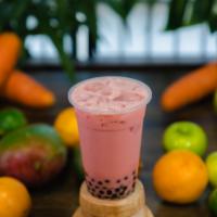 Strawberry Milk Tea · Strawberry milk tea flavor with tapioca pearls. Made with high quality Earl Grey tea leaves.