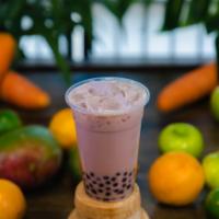 Taro Milk Tea · Taro milk tea flavor with tapioca pearls. Made with high quality Earl Grey tea leaves.