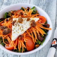 Santorini Salad · Mixed greens, figs, tomatoes, feta cheese, cucumbers, shredded carrot and served with choice...