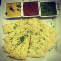 Flatbread with Dippers · Seasoned organic flatbread drizzled with olive oil. Served with marinara, hummus and spinach...