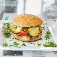 Veggie Grill Sandwich · Roasted: artichokes, red onions, bell peppers, zucchini, and fresh tomatoes. All drizzled wi...