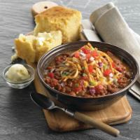 Callender's® Famous Chili & Cornbread · Angus ground beef, tender beans and sweet onions topped with aged cheddar cheese, tortilla s...