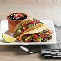 Veggie Tacos · Grilled red onions, mushrooms, poblano peppers, red bell peppers, zucchini and our three-che...