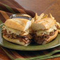 French Dip Supreme Sandwich · Sliced USDA Choice roast beef with caramelized onions, sautéed mushrooms and melted swiss ch...