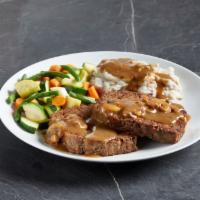 Marie's Meatloaf · Slow -baked with 100% Angus ground beef, onions, green peppers, carrots and special seasonin...