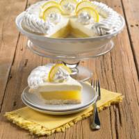 Double Cream Lemon Pie · Sweet and tart lemon custard, topped with a blend of rich vanilla cream and fresh sour cream.