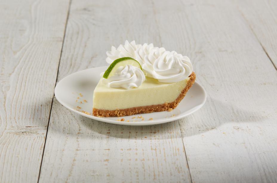 Key Lime Pie · Key limes blended creamy and smooth in a graham cracker crust, topped with fresh whipped cream.