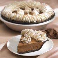 Whole Chocolate Satin Pie · Rich chocolate fills a chocolate cookie crust with a rim of fresh whipped cream.