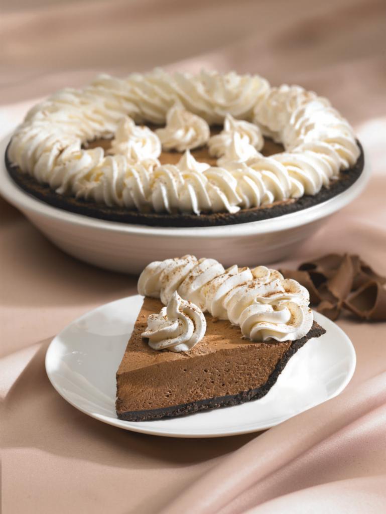 Chocolate Satin Pie · Rich chocolate fills a chocolate cookie crust with a rim of fresh whipped cream.