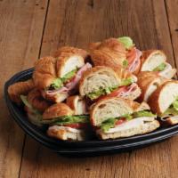 An Assortment of Turkey, Ham & Roast Beef on Croissants · THIS ITEM REQUIRES 2 HR ADVANCE NOTICE. If you are ordering outside of this window, your ord...