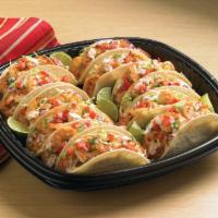 Grilled Shrimp Street Taco Platter · 
Grilled ancho-marinated shrimp nestled inside soft corn tortillas with shredded cabbage, on...