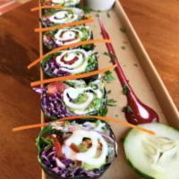 Dynamite Roll (V) · Cashew cheese, red cabbage, tomato, avocado, ginger, red onion, coco jerky, ranch, hemp oil ...