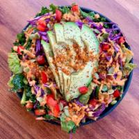 Chipotle Salad · Kale, bell pepper, tomato, avocado, red cabbage, chipotle dressing, walnut bits and pumpkin ...