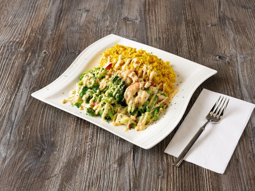 Jumbo Lump Platter · Shrimp and crab. Our jumbo lump platter features premium lump crabmeat, grilled jumbo shrimp, fresh cut broccoli, red peppers, green peppers.