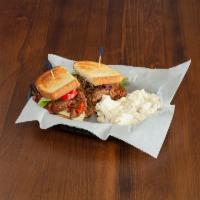 Rick’s Big Meatloaf Sandwich · Your demands have been met! Thick slices of our meatloaf served on toasted sourdough with ba...