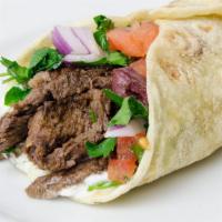 Gyro (Lamb&Beef) Wrap  · Gyro (Lamb&Beef) wrapped with lettuce, tomatoes, onions and taziki sauce.  
