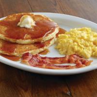 Marie's Magnificent 6 · Two eggs any style, two house-made, fluffy buttermilk pancakes and two sausage links or stri...