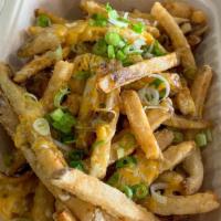 Loaded Fries · Fresh cut fries topped with grilled onions, tomatoes, green onions, cheese and sour cream. E...