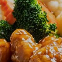 Orange Chicken Plate · Crispy chicken tossed in Orange sauce, topped with sesame seeds and served with steamed broc...