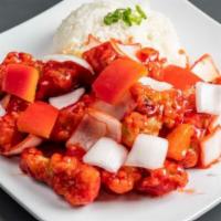 Sweet and Sour Chicken Plate · Crispy chicken tossed in sweet and sour sauce served with red bell peppers, onions, pineappl...