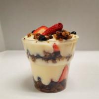 Yogurt Parfait · Vanilla Greek layered between house-made pecan granola and berries.