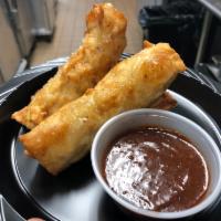 Chicken Cheesesteak Eggrolls · Chicken cheesesteak and fried onions served with chipotle sauce.