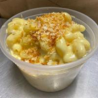 Mac and Cheese · Corkscrew pasta, our special blend of cheeses and toasted panko crumbs.  Add a Topping For A...