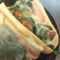 Italian Chicken Grinder · Italian style chicken tenders, prosciutto, spinach and roasted red peppers topped with sharp...