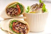 BBQ Chicken Wrap · BBQ breaded chicken with turkey bacon, shredded lettuce and cheddar cheese. Served with choi...