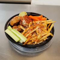 Crispy Chicken Wings Combo · Crispy chicken wings with house-made sauce paired with a choice of fries, Carrots, celery or...