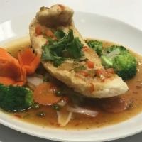 64. A Taste of Tilapia · Fried tilapia filet in sam ros, 3 flavored sauce sweet, sour, and chili served with mixed ve...