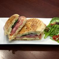 P17 · Prosciutto panini with fontina cheese, red onion, fresh basil leaves & extra virgin olive oil