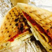 P25 · Grilled chicken panini with smoked mozzarella & sun dried tomato