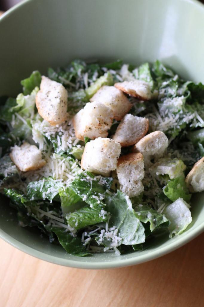 The Caesar Salad · Romaine, croutons and Parmesan cheese tossed in Caesar dressing. Add protein for an additional charge.