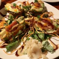 Avocado Bomb · Lightly battered avocado filled with spicy tuna in sweet brown sauce and aoli sauce. Medium ...