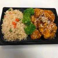 Sesame Chicken · Crispy white meat chicken in sweet sesame sauce ,top with sesame seeds 