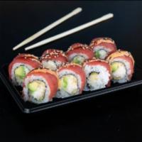 R1. Dallas Roll · Spicy crabmeat, avocado, tempura flake, topped with ahi tuna and chef's special sauce.