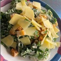Insalata Caesar  · Chopped kale, house made Caesar dressing, croutons and shaved Parmesan Cheese