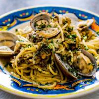 Spaghetti Vongole · Spaghetti with clams in an olive oil and garlic sauce with Italian parsley, or request with ...