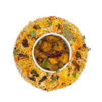 555 - Chicken Biryani - New · Chicken is marinated with spices and rich almond and cashew sauce, then pan-fried with the p...