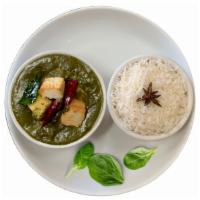 Saag Paneer · Cheese cubes and spinach cooked with spices and gravy sauce, served with a side of aromatic ...