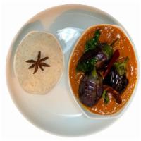 Gutthi Vankaya Curry · Stuffed eggplant and brinjal curry in traditional Andhra style, served with a side of aromat...
