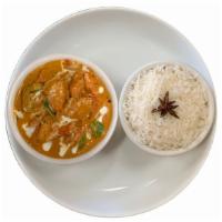 Chicken Tikka Masala · Chicken baked in clay oven and cooked with spicy sauce with bell peppers and onions, served ...
