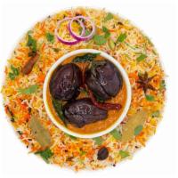 Guthi Vankaya ( Indian Eggplant) Biryani · Indian Eggplant is tossed in gravymade with cashews, peanuts, and ablend of spices
gravy the...