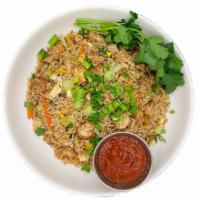 Fried Rice · Fried Rice is street style delicious wok-tossed rice with veggies and sauces on high flame t...