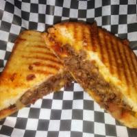 Angry Steak Melt · Season sauteed steak, jalapeno peppers, bacon, cheddar Jack cheese, mad sauce, grilled golde...